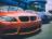 orange-bmw-car-beside-blue-bugatti-car-235226